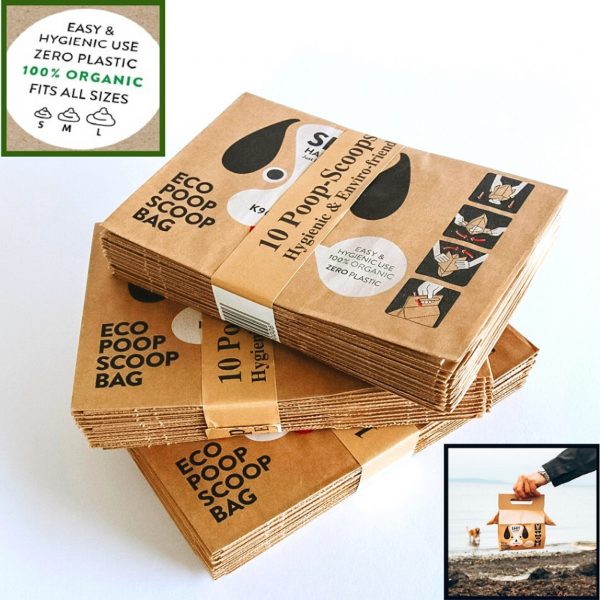 A stack of the best biodegradeable paper dog poop bags, the Eco Poop Scoop bags from K9 Clean!